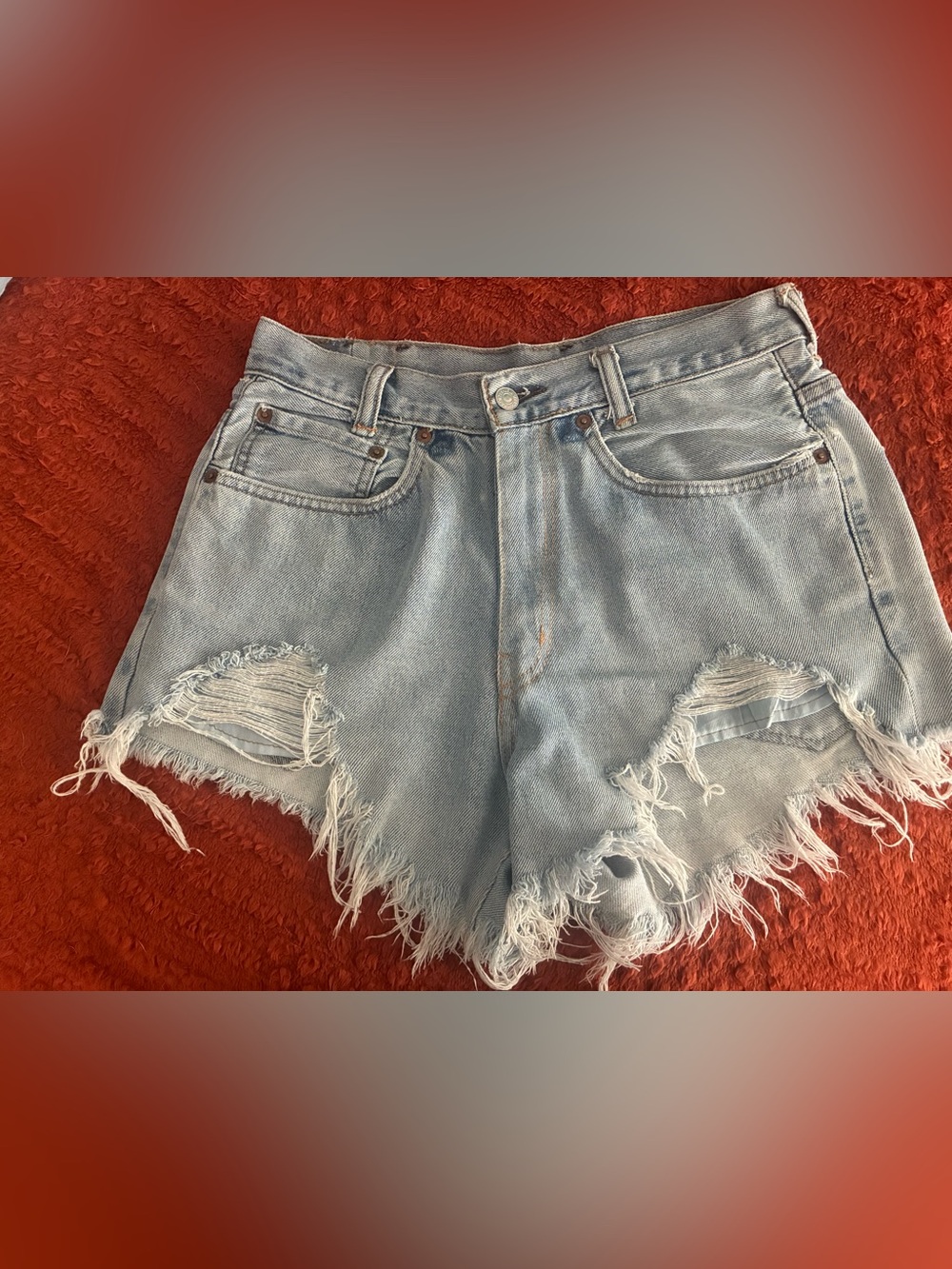 Levi’s 501 High-Waist Distressed Light Blue Denim Shorts